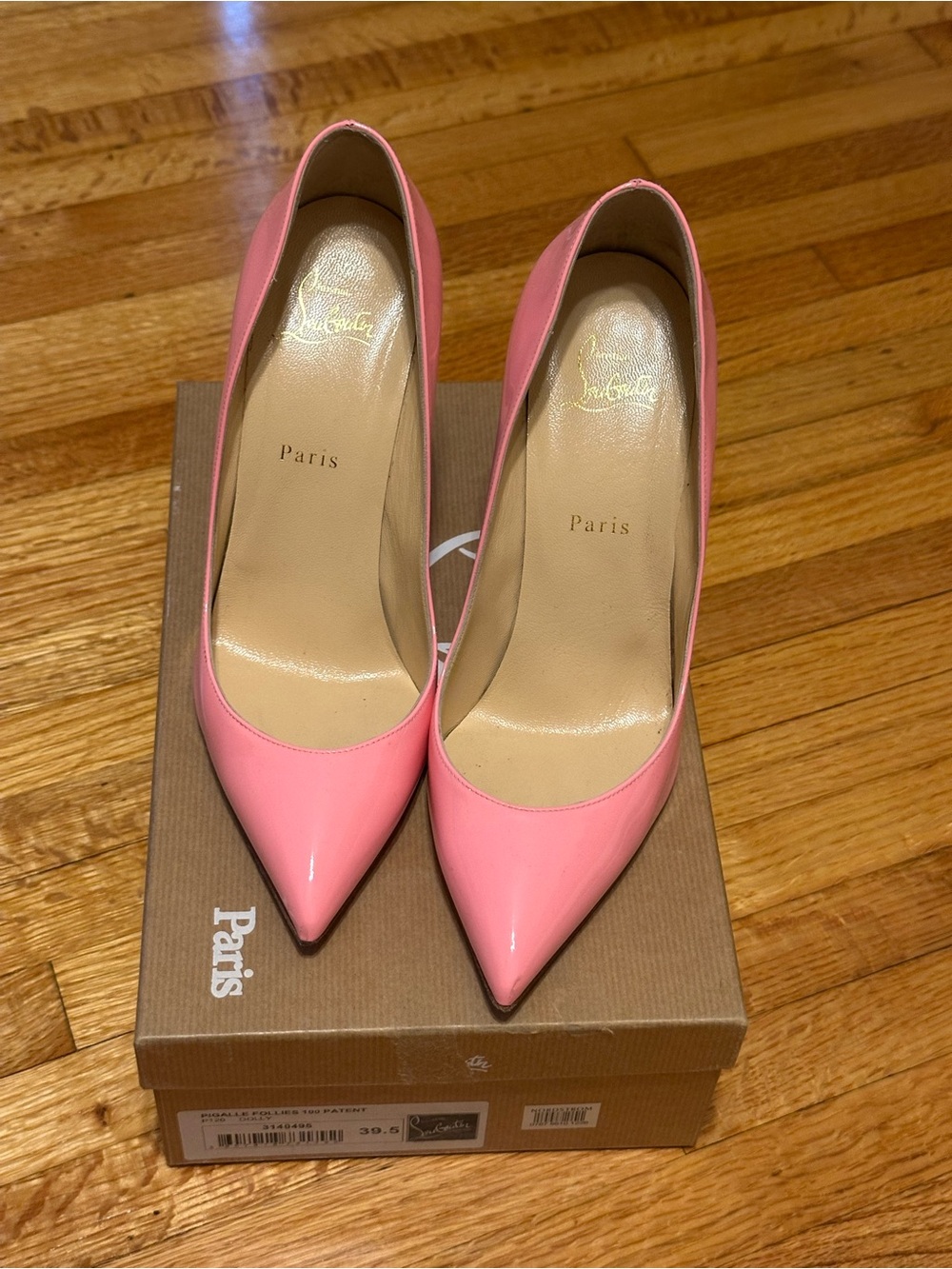 pink patent leather Christian Louboutin Pigalle Follies 100 pumps in Dolly 